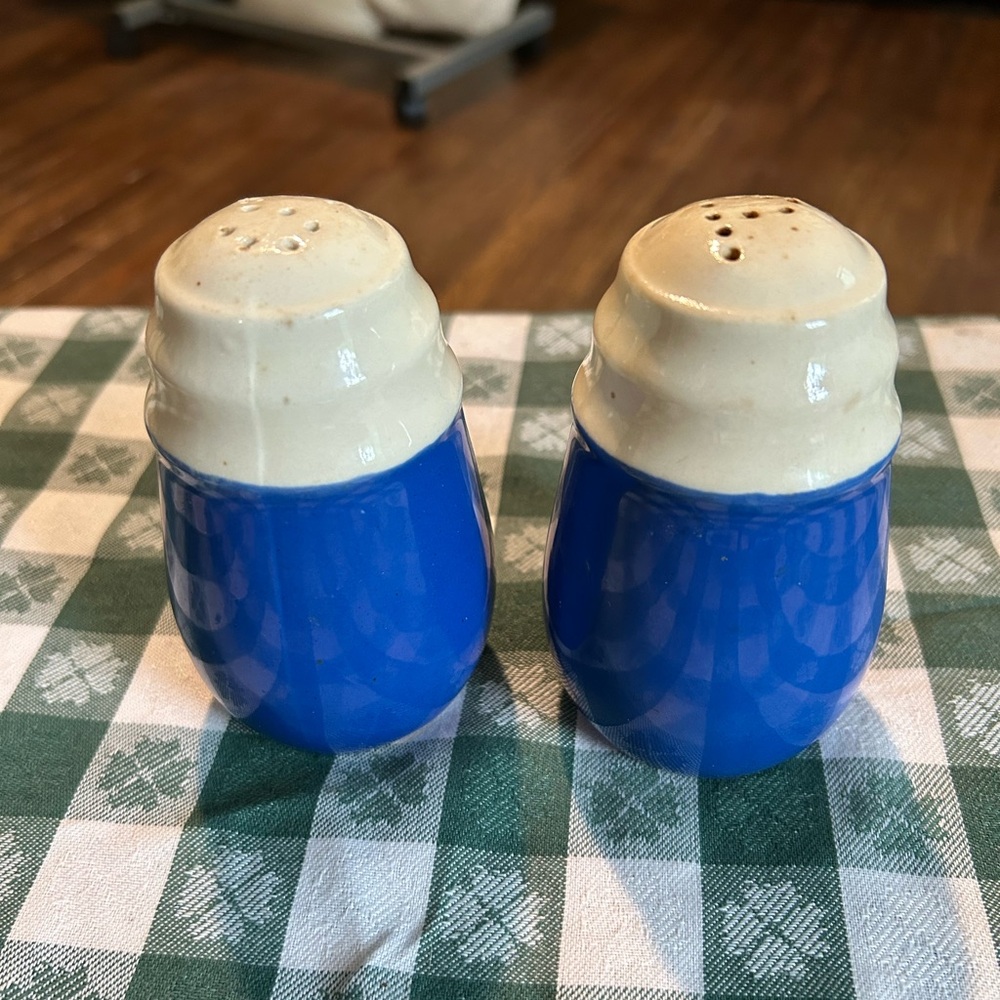 Vintage universal pottery, Blue and Cream Salt and Pepper Shakers. 4 1/2” tall